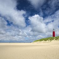 Leuchtturm Roter Leuchtturm am Strand der Nordsee