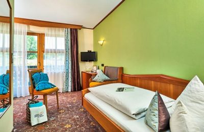Einzelzimmer “Morgenrot” Bett im Einzelzimmer