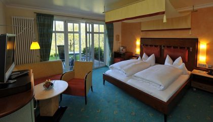 Komfortdoppelzimmer Kleine Meerjungfrau Bett im Komfortdoppelzimmer Kleine Meerjungfrau