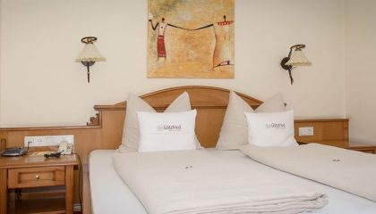 Landhaus Suite Bett in der Landhaus Suite