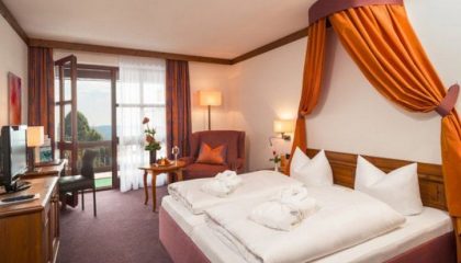 Doppelzimmer Kategorie I Bett im Doppelzimmer Kategorie I