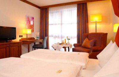 Doppelzimmer Kategorie II Bett im Doppelzimmer Kategorie II
