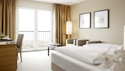 Doppelzimmer Superior Bett im Doppelzimmer Superior