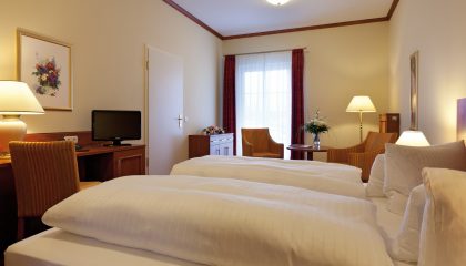 2-Raum Suite / Familienzimmer Betten und Wohnraum 2-Raum Suite Familienzimmer